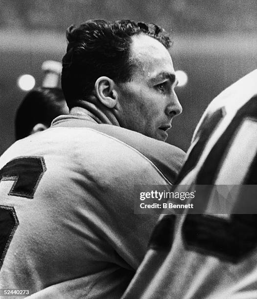 Canadian hockey player Henri Richard of the Montreal Canadiens watches the action from the bench, 1960s.