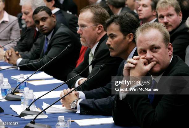 Boston Red Sox pitcher Curt Schilling, Rafael Palmeiro of the Baltimore Orioles, former St. Louis Cardinals Mark McGwire and Sammy Sosa of the...