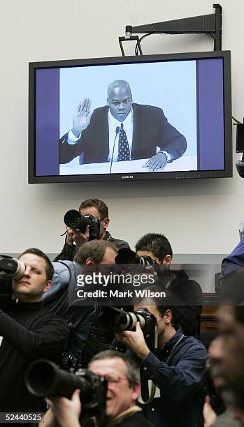 Chicago White Sox Frank Thomas is sworn in via teleconference monitor during a House Committe session investigating Major League Baseball's effort to...