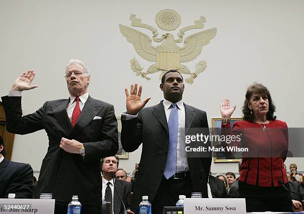 Baltimore Oriole Sammy Sosa is sworn in during a House Committe session investigating Major League Baseball's effort to eradicate steroid use on...