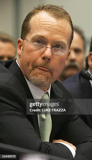 Retired Major League Baseball star Mark McGwire testifies before a House Government Reform Committee hearing on steroid use in the MLB 17 March 2005...