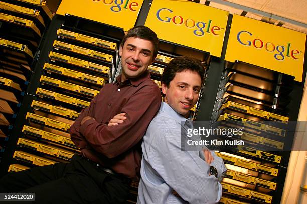 Larry Page , Co-Founder and President, Products and Sergey Brin, Co-Founder and President, Technology pose inside the server room at Google's campus...