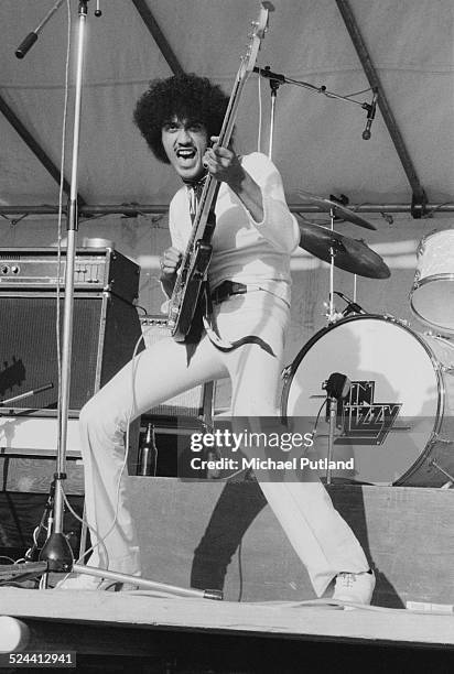 Irish singer and musician Phil Lynott performing with Irish rock group Thin Lizzy at the Reading Festival, 24th August 1974.