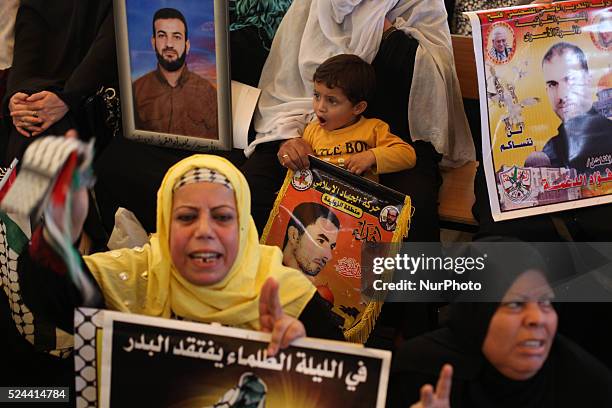 Relatives of Palestinian prisoners in Israeli jails during a demonstration in solidarity with Palestinian prisoners in Israeli jails, in front of the...