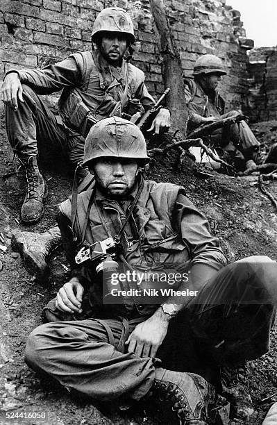 British photojournalist Don McCullin in the walled city of Hue, South Vietnam during the Tet Offensive when US Marines were attempting to retake the...