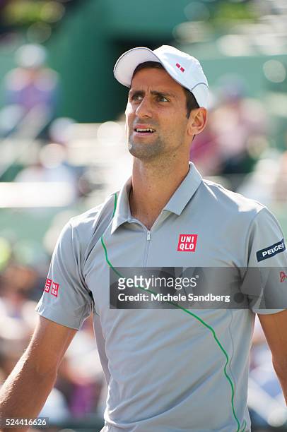 Novak Djokovic of Serbia playing against Andy Murray of Great Britain during their match on Day 10