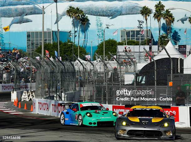 The SRT Motorsports Viper GTS-R of Jonathon Bornarito and Kuo Wittmer and the Team Falken Tire Porsche 911 RSR of Wolf Henzler and Bryan Sellers...