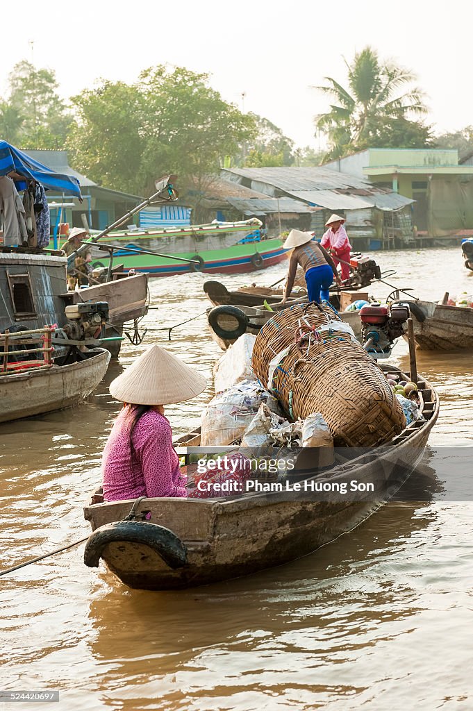 Rowboat From Rear Rear View Of A Woman On Rowboat At Floating Market Photo - Getty Images