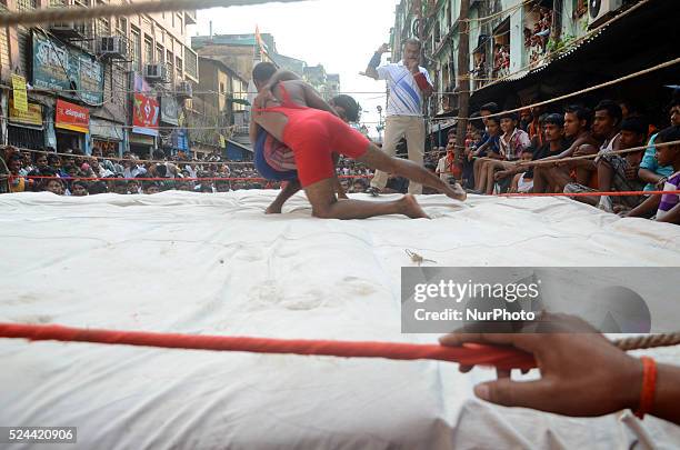 Streetside wrestling competition organised by the merchants of Burrabazar on the eve of Diwali festival in Burrabazar on 24th October 2014, in...