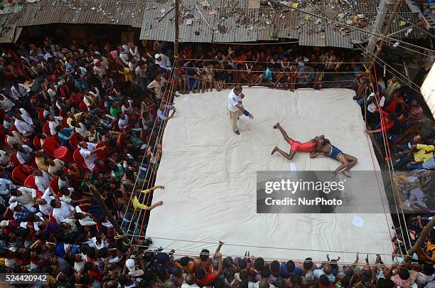 Streetside wrestling competition organised by the merchants of Burrabazar on the eve of Diwali festival in Burrabazar on 24th October 2014, in...