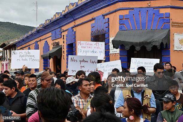 mexico protest over 43 missing students - students protest over disappearance of a student stock pictures, royalty-free photos & images