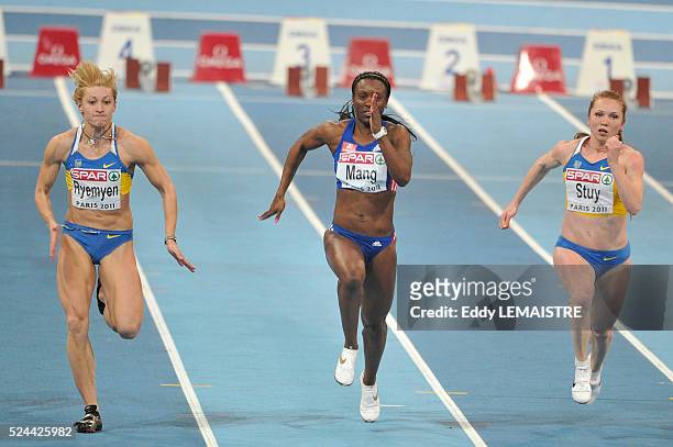 Mariya Ryemyen of Ukraine, Veronique Mang of France and Hrystyna Stuy of Ukraine compete in the Women's 60m semi final during day 2 of the 31st...