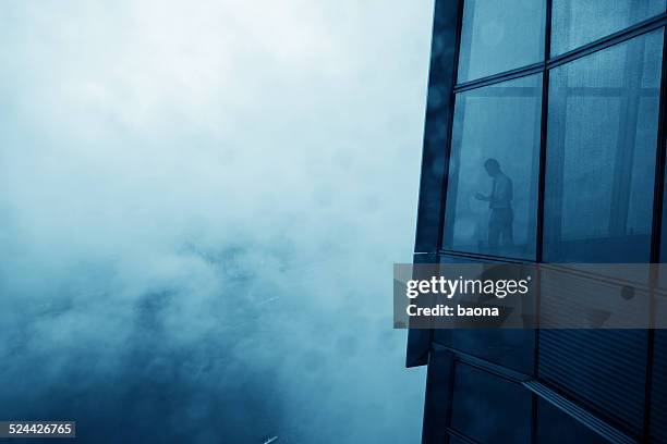 businessman in a skyscraper - bar silhouette bildbanksfoton och bilder