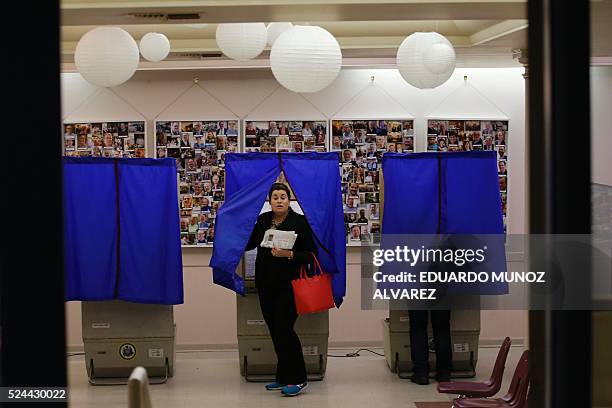 People cast their ballots in a polling station during the presidential primary election on April 26, 2016 in Philadelphia, Pennsylvania. Five US...