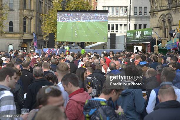 People, in the Rugby fan zone in Albert Square, central Manchester, England, attending the live broadcast of Rugby World Cup 2015 matches by...