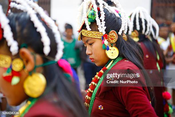 Nepalese Gurung community men and women wearing traditional dress dance as they take part in a parade to mark their New Year known as ‘Tamu Losar' in...