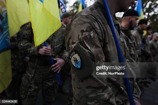 Soldiers of Azov volunteer battalion take part in a march that was confined to the 72nd anniversary of the Ukrainian Insurgent Army