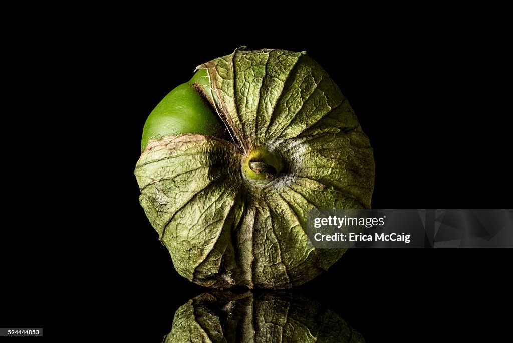 Tomatillo isolated on black background