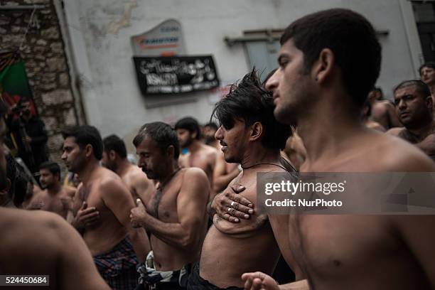 Members of the Shiite community take part in a ceremony to mark Ashura, the holiest day on the Shiite calendar, in Piraeus, Greece, Saturday 24...