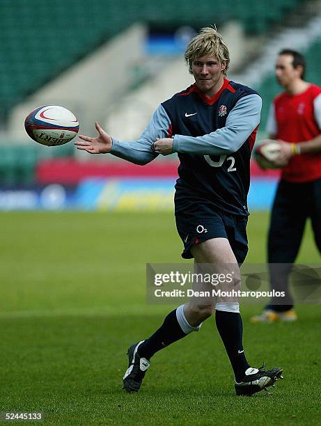 Ollie Smith throws a pass during the England Rugby Union training session prior to the RBS Six Nations match against Scotland at Twickenham Stadium...