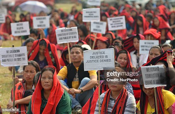 Tribal Yimchungr�� Naga with placard during a protest rally against the February 6 murder of a couple between Kiphire and Shamator, rampant mob...