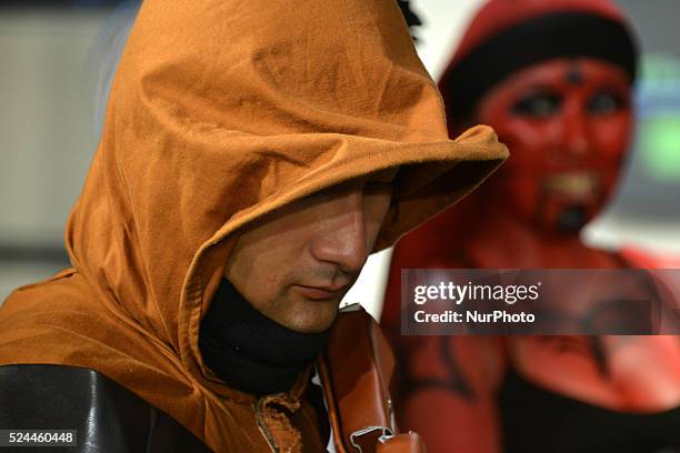 Fans dressed as a Star Wars character poses in Tokyo for the first screening of the latest episode of Star Wars: The Force Awakens on December 19...