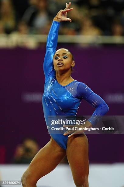 Visa Federation of International Gymnastics - Daiane Dos Santos of Brazil performs the Artistic Floor exercise during the Women's Final at the O2...