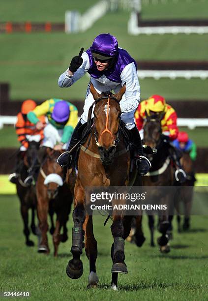 Barry Geraghty riding Kicking King rides up the home staright to win the Totesport Cheltenham Gold Cup steeple chase race at the Cheltenham Festival...