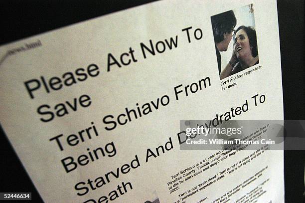 Literature hangs on a bulletin board at Our Lady of Good Counsel church, where Terri Schiavo attended grade school, showing support for her and her...