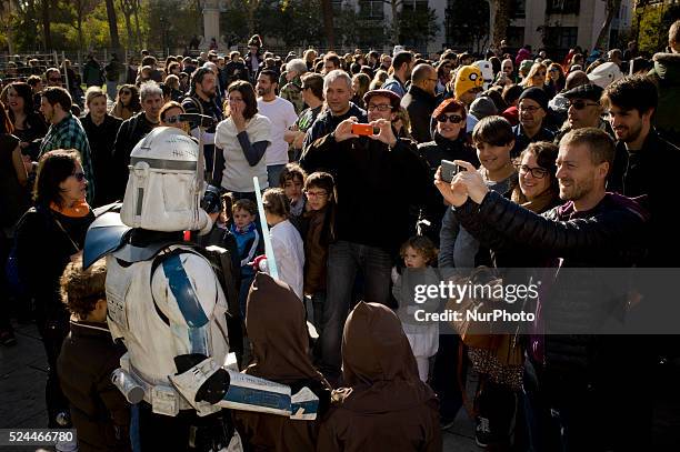 People dressed as characters from the film series Star Wars poses for photographs in Barcelona, Spain during a meeting of Star Wars fans on 29...