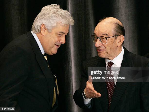 Federal Reserve Chairman Alan Greenspan greets John Taylor , President and CEO of the National Community Reinvestment Coalition, prior to speaking...