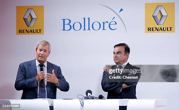 The CEO of French carmaker Renault, Carlos Ghosn, and French industrial group Bollore head Vincent Bollore give a press conference at the Atelier...