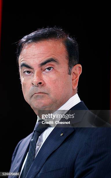 The CEO of French carmaker Renault, Carlos Ghosn, and French industrial group Bollore head Vincent Bollore give a press conference at the Atelier...