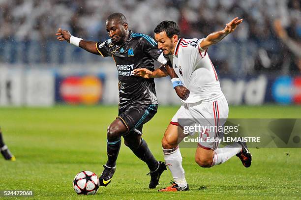 Marseille's Mamadou Niang and Milan's Gianluca Zambrotta during the UEFA Champions League soccer match, Olympique de Marseille vs AC Milan at the...