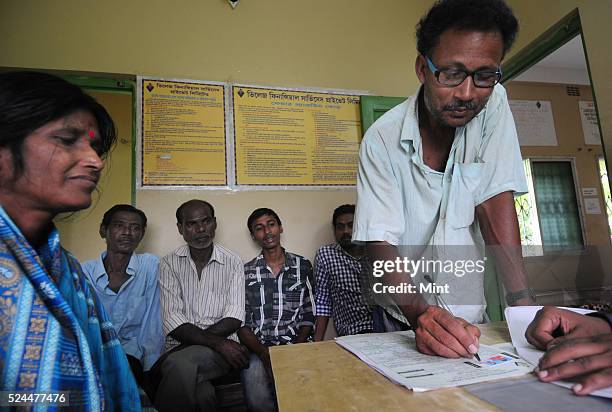 Women members of Village Financial Services Pvt Ltd, which is joint liability group for sustainable development, gather to complete formalities of...