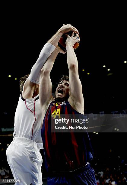 Real Madrid's Argentine player Andres Nocioni and Barcelonas Croatian player Ante Tomic during the Basket Euroleague 2014/15 match between Real...