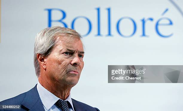 The CEO of French carmaker Renault, Carlos Ghosn, and French industrial group Bollore head Vincent Bollore give a press conference at the Atelier...