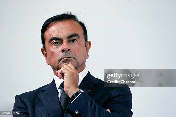 The CEO of French carmaker Renault, Carlos Ghosn, and French industrial group Bollore head Vincent Bollore give a press conference at the Atelier...