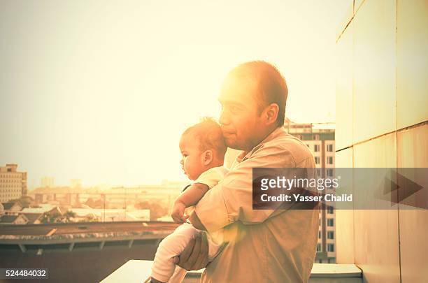 father and son - leanincollection stock pictures, royalty-free photos & images