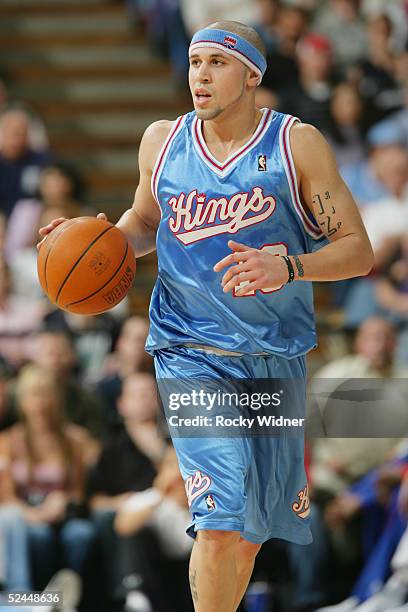 Mike Bibby of the Sacramento Kings drives against the Detroit Pistons during the game at Arco Arena on March 6, 2005 in Sacramento, California. The...