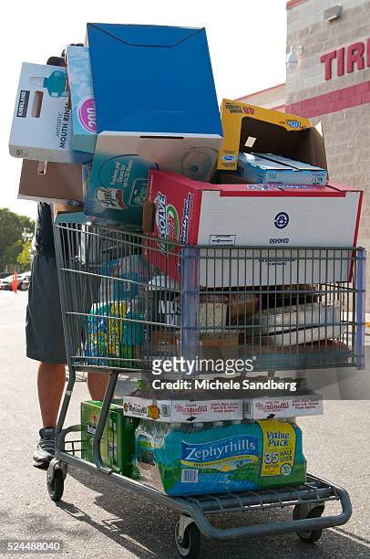 August 23, 2012 ANDRES DIAZ buying beverages, food and supplies in preparation of Storm Isaac. South Florida prepares for Storm Isaac.