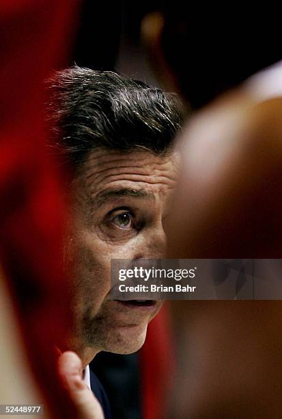 Head coach Rick Pitino of the Louisville Cardinals talks to his team during a stoppage in play against the Louisiana-Lafayette Ragin' Cajuns in the...