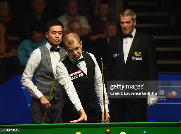 Barry Hawkins of England looks on during his quarter final match against Marco Fu from Hong Kong on day eleven of the World Championship Snooker at...