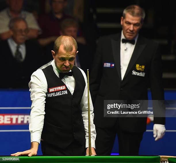 Barry Hawkins of England looks on during his quarter final match against Marco Fu from Hong Kong on day eleven of the World Championship Snooker at...