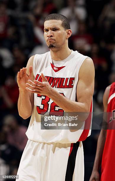 Francisco Garcia of the Louisville Cardinals celebrates late in game against the Louisiana-Lafayette Ragin' Cajuns in the first round of the NCAA...