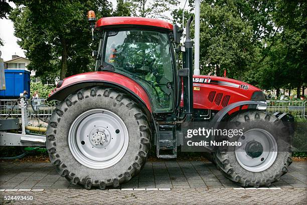 July 2015 - A Case IH tractor is seen. This month carmaker Fiat Chrysler Automobiles and tractor manufacturer CNH Industrial signed a labor deal for...