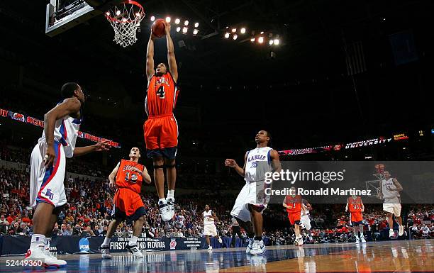 Donald Brown of the Bucknell Bison goes up for a dunk in the first half against the Kansas Jayhawks during the first round of the NCAA Men's...