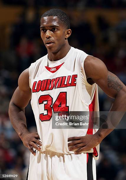 Larry O'Bannon of the Louisville Cardinals takes a break during a stoppage against the Louisiana-Lafayette Ragin' Cajuns in the first round of the...