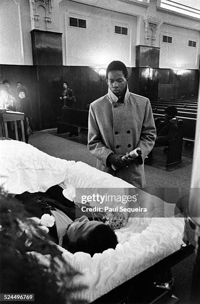 Inside the Rayner Funeral Home, members of the community file past the open casket of Fred Hampton, the slain Black Panther Party leader, to pay last...