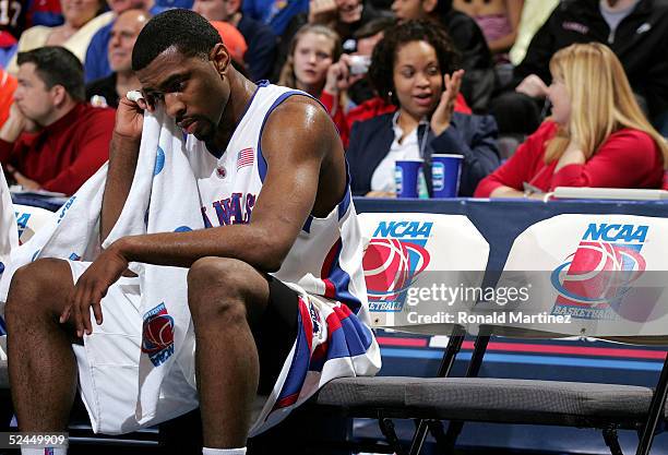 Keith Langford of the Kansas Jayhawks sits on the bench late in the second half against the Bucknell Bison in the first round of the NCAA Men's...